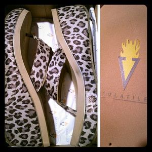 Cheetah print wedge flip flops