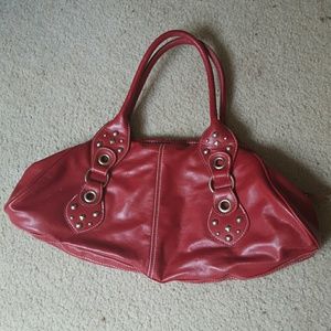 Red studded handbag