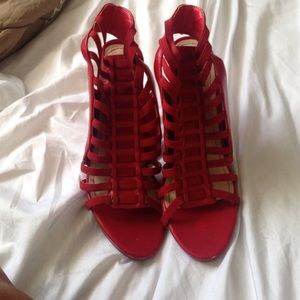 Red strappy shoes