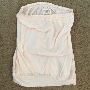 A light pink tube top