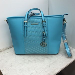 Saffiano leather lotty dotty bag by La Terre