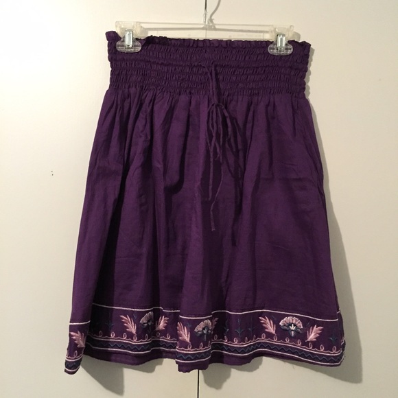 Purple skirt with embroidered hem