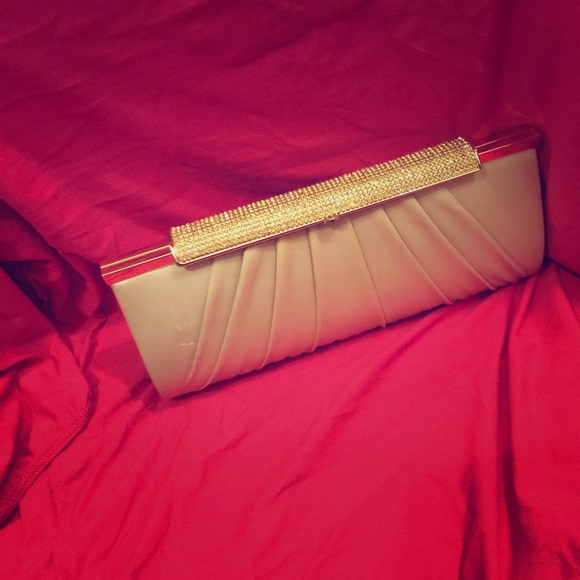 Tea rose colored clutch with pink stones