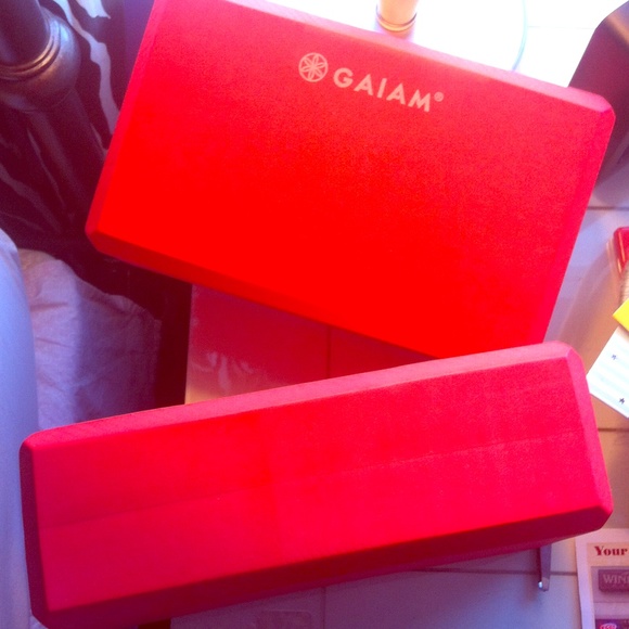 Two red Gaiam yoga blocks