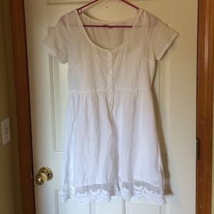 White lace embellished dress by Volcom