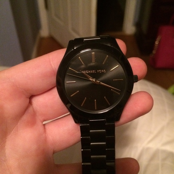 Black MK watch with gold detail