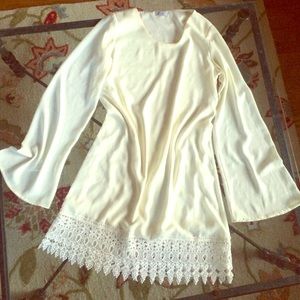 White/cream flowing dress with touch lace trim