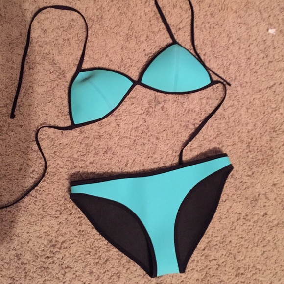 Bathing suit never worn. Wet suit material