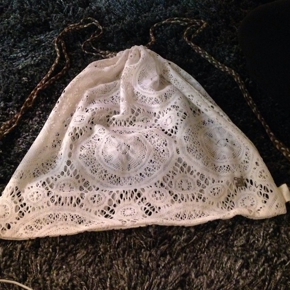 BKE White lace drawstring backpack.