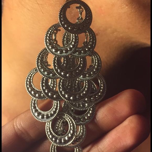A pair of Silver Lia Sophia earrings