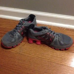 Grey and pink Nike shox