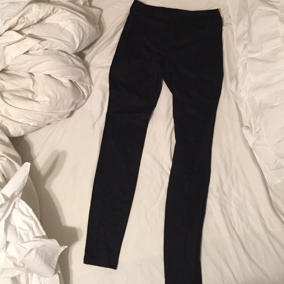 Black pleaded leggings