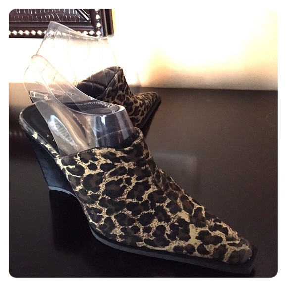 Animal print wedge mule wedges.