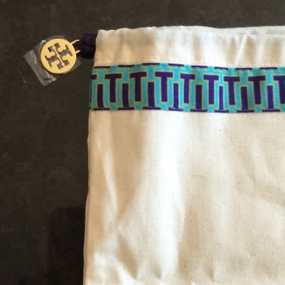 With Tory burch dust bag