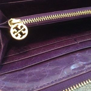 Tory Burch distressed leather purple wallet