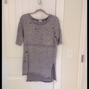 Distressed Free people T-shirt. Never worn.