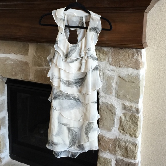 Cream Fitted ruffle dress with feather print