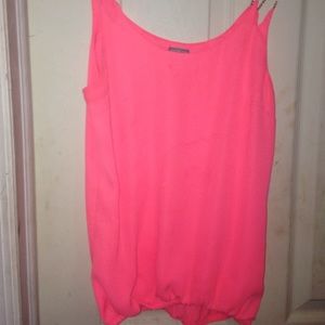 pink neon shirt with gold chain straps