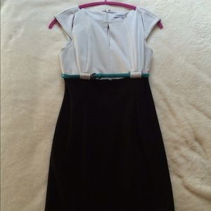 black and white dress with turquoise belt