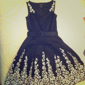 Black dress with white embroidering