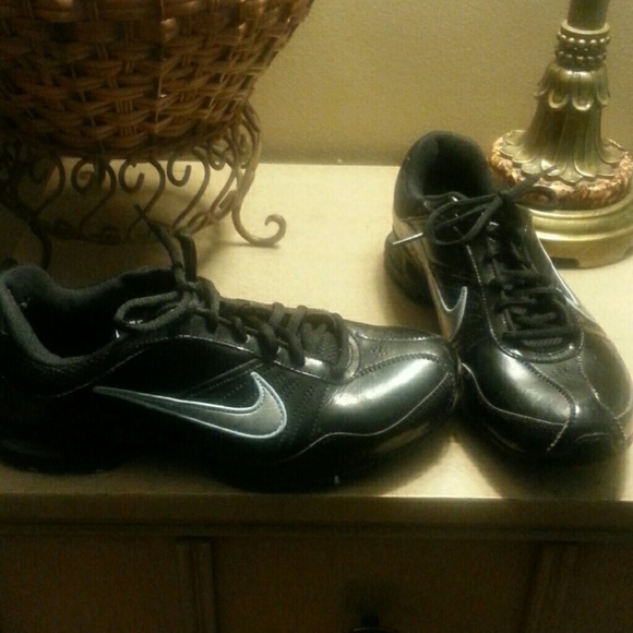 Nike black with silver swoosh trimmed in blue