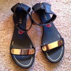 Gold and black sandals