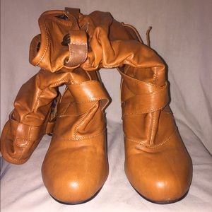 Orange calf length heeled boots