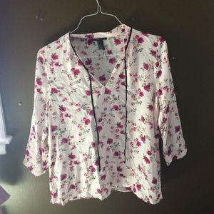 Floral shirt with a light pink shade