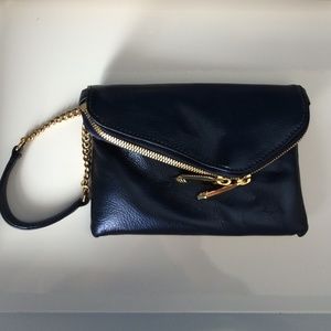 Henri Bendel metallic navy wristlet clutch