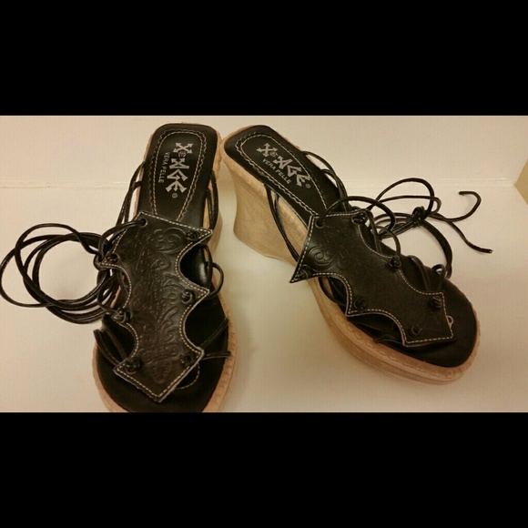 Black gladiator sandals.