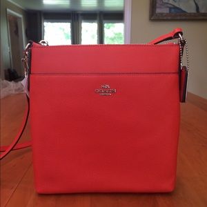 Coach North/South Swingpack  in Embossed Leather