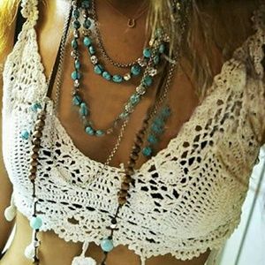 Sexy cropped halter with tassels to tease!