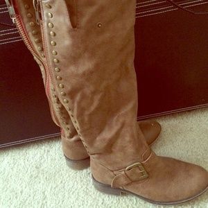 Tall brown riding boots