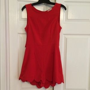 Adorable Red Scalloped Romper.