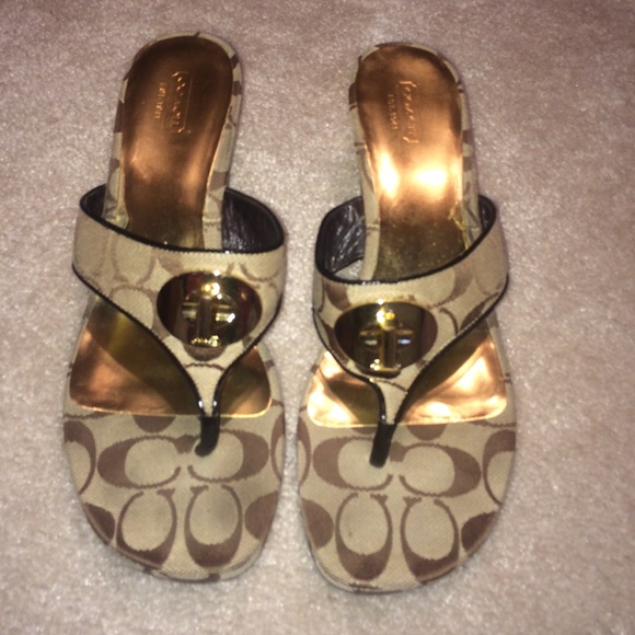 Brown coach emblem Coach™ wedges.