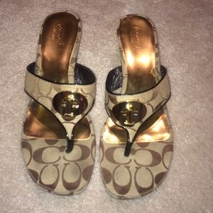 Brown coach emblem Coach™ wedges.