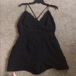 Crochet trimmed black romper