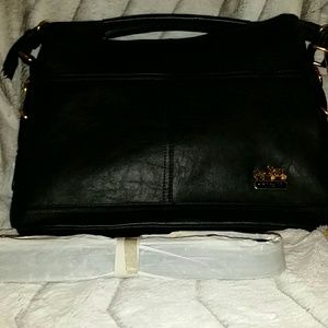 Midnight black Coach purse with additional strap