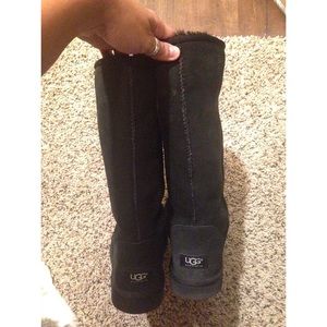 Tall black uggs. Basically new