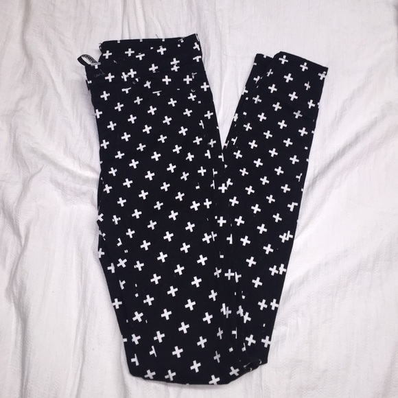 Black jeans with white cross detailing