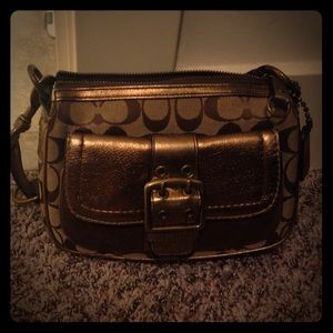 Small brown & golden/bronze coach shoulder bag!