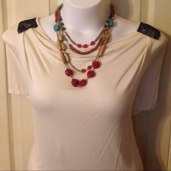 Cream tunic with black lace back