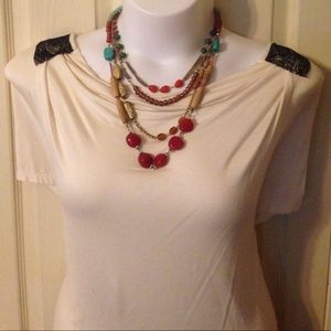 Cream tunic with black lace back