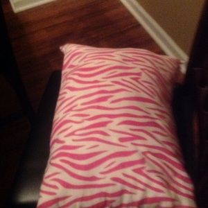 A pink zebra print pillow 😍
