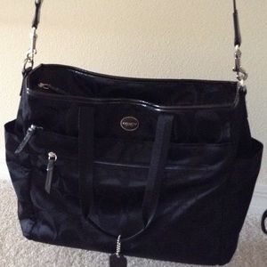 Never been used authentic Coach Diaper Bag