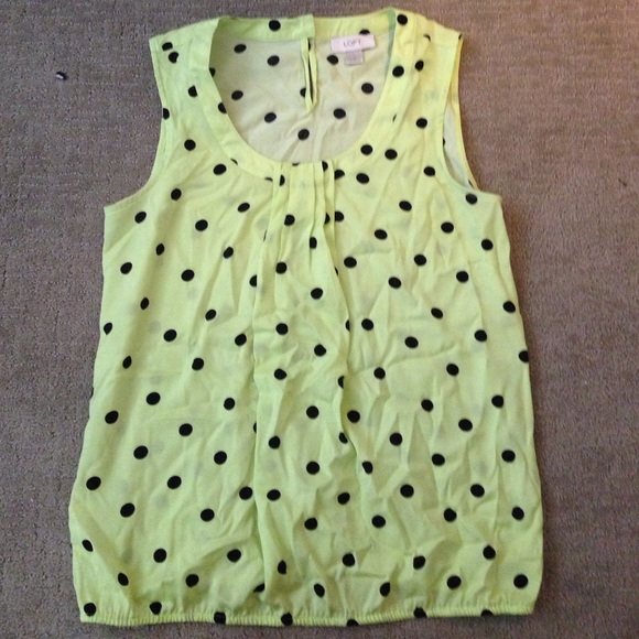 Neon yellow top with black polka dots