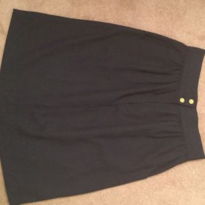 Vintage navy skirt with gold button details.