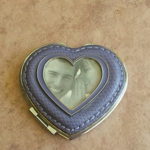 New locket compact mirror.
