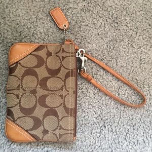 Slightly used coach wristlet