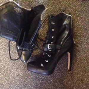 Black lace up heeled boots